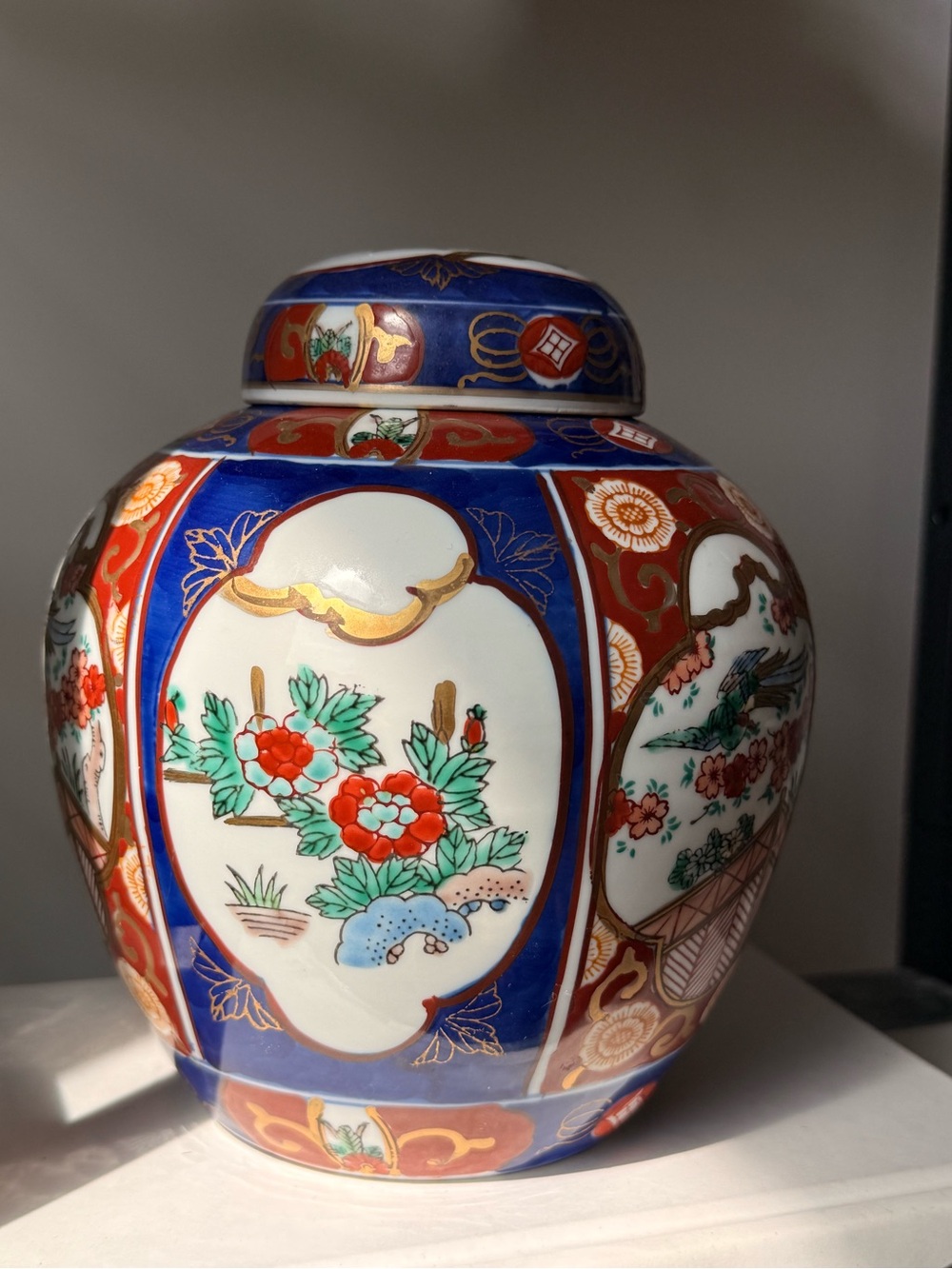 Hand-Painted Blue and Red Porcelain Ginger Jar with Floral Motifs